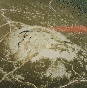 Oblique aerial view centred on the remains of the fort, taken from the W.