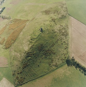 Oblique aerial view centred on the remains of the fort and rig, taken from the ENE.
