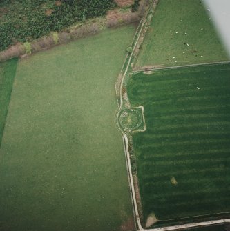 Oblique aerial view of the remains of the recumbent stone circle, taken from the E.