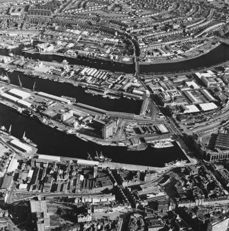 Aberdeen Harbour, oblique aerial view, taken from the NNW. The E end of Union Street is visible in the foreground.