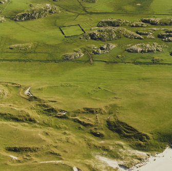 Oblique aerial view ofTraigh Na Criche, taken from the north, centred on farmstead and cultivation remains.