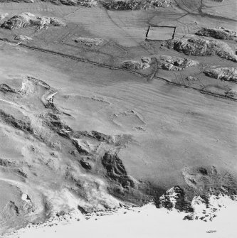 Oblique aerial view ofTraigh Na Criche, taken from the north, centred on farmstead and cultivation remains.