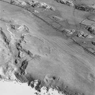 Oblique aerial view ofTraigh Na Criche, taken from the north east, centred on farmstead and cultivation remains.