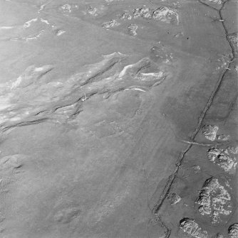 Oblique aerial view ofTraigh Na Criche, taken from the west, centred on farmstead and cultivation remains.