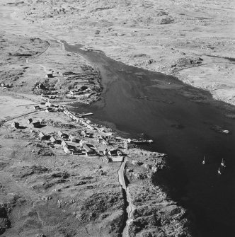 Oblique aerial view of Arinagour, taken from the south, centred on the town.