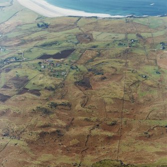 Oblique aerial view of the crofting township and field-system, taken from the ENE.