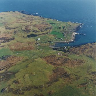 Oblique aerial view centred on Port Mor and the remains of the township with the chapel adjacent, taken from the W.