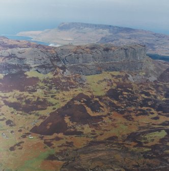 Oblique aerial view centred on the remains of the An Sgurr fort, taken from the SSW.