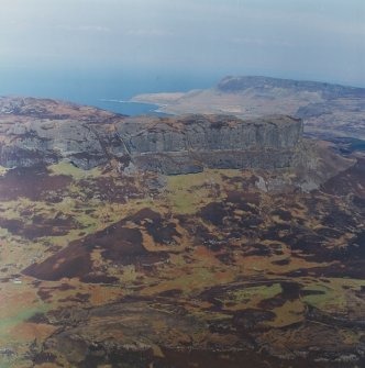Oblique aerial view centred on the remains of the An Sgurr fort, taken from the S.