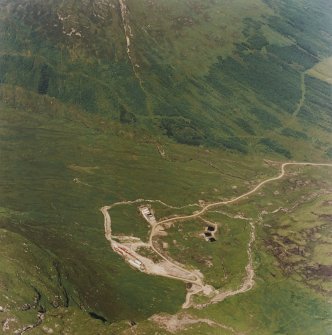 Oblique aerial view centred on the mine and buildings, taken from the SW.