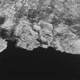 Oblique aerial view of Duart centred on the remains of the township, rig, field-system and head-dyke, taken from the W.