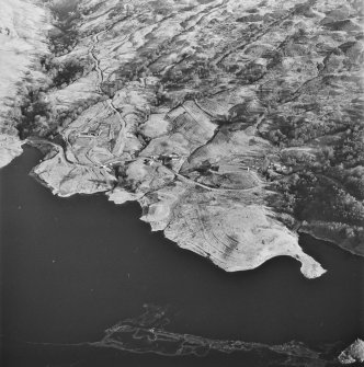 Oblique aerial view of Duart centred on the remains of the township, rig, field-system and head-dyke, taken from the WSW.