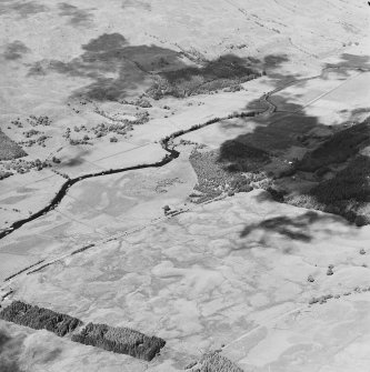 General oblique aerial view looking along the River Dochart, taken from the SSW.