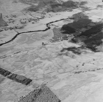 General oblique aerial view looking along the River Dochart, taken from the S.