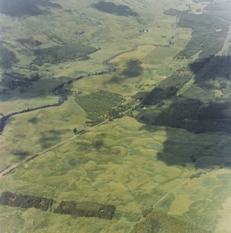 General oblique aerial view looking along the River Dochart, taken from the SSW.