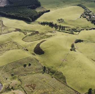 Oblique aerial view centred on the remains of the fort, taken from the ENE.