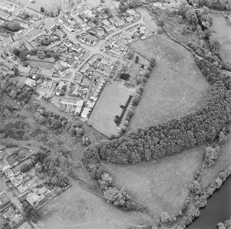 Oblique aerial view centred on the excavations of the Roman fort and possible annexe, taken from the WSW.