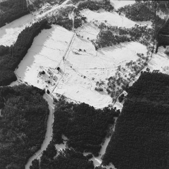 Oblique aerial view centred on the remains of the township, taken from the ENE.