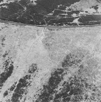 Oblique aerial view of Sheriff Muir centred on trackways, gun-emplacements, bunkers and trenches, taken from the N.