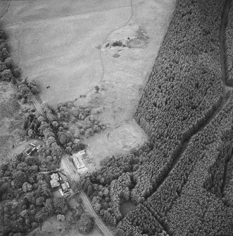 Oblique aerial view centred on the remains of the fortlet, taken from the NE.