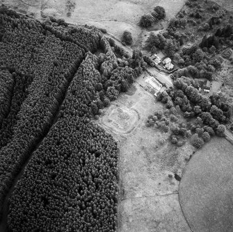 Oblique aerial view centred on the remains of the fortlet, taken from the NW.
