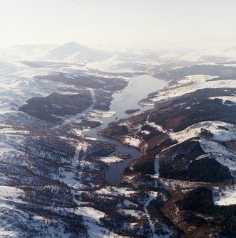 General oblique aerial view of the reservoir with Schiehallion in the distance, taken from the ENE.