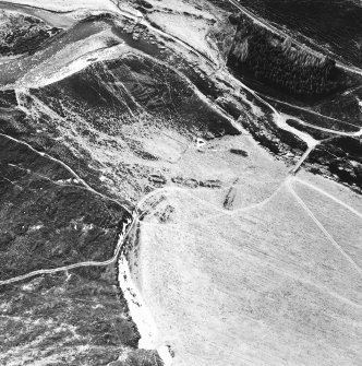 Stronetoper, oblique aerial view, taken from the NE, centred on the remains of a farmstead. Parts of a township are visible in the centre right of the photograph.