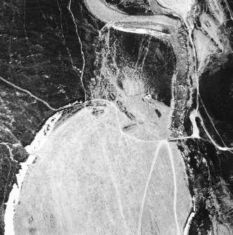 Stronetoper, oblique aerial view, taken from the N, centred on the remains of a farmstead. Parts of a township are visible in the right half of the photograph.