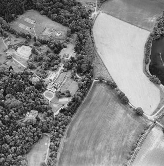Oblique aerial view of Dalguise House centred on the house, taken from the SSE.