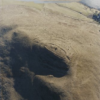 Oblique aerial view centred on the remains of the fort, taken from the N.