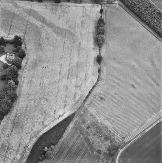 Inverdunning House, oblique aerial view, taken from the WSW, centred on the cropmark of an enclosure.