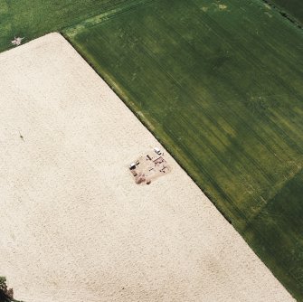 Oblique aerial view centred on the excavation of the Roman watch tower, taken from the NNE.