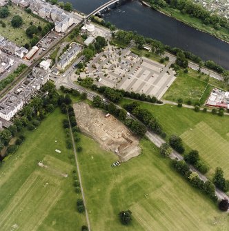 Oblique aerial view centred on the excavations of the Cromwellian fort, taken from the SW.