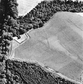 Cambusmichael, oblique aerial view, taken from the WNW, centred on the cropmarks of the Grange. Cambusmichael Church is visible in the centre left of the photograph.