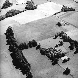 Oblique aerial view centred on the cropmarks of the Roman Fortress, taken from the WSW.