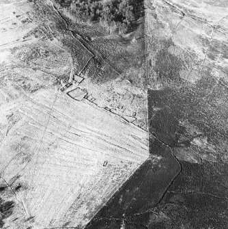 Oblique aerial view centred on the remains of the township, rig and head-dyke, taken from the S.