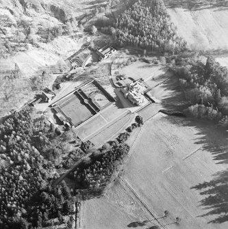 Oblique aerial view centred on the castle, taken from the NNW.