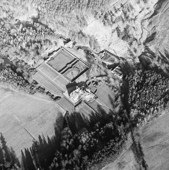Oblique aerial view centred on the castle, taken from the W.