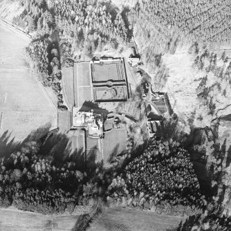 Oblique aerial view centred on the castle, taken from the SW.