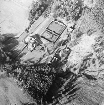Oblique aerial view centred on the castle, taken from the SSW.