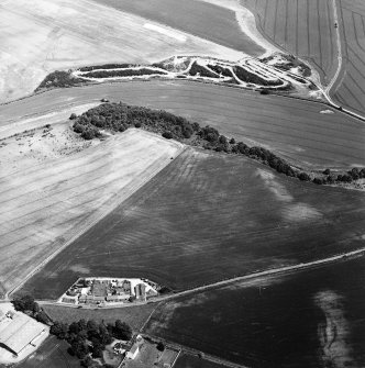 Oblique aerial view of cropmarks of rig, taken from the SW.