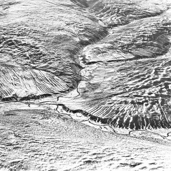 Oblique aerial view of Noran Water centred on the remains of a township, taken from the ESE.