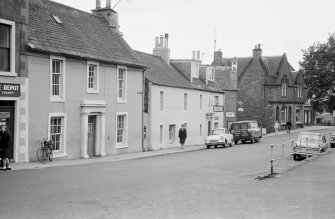 General view of the Black Bull Hotel and Harthope House, Churchgate, Moffat, from north west.