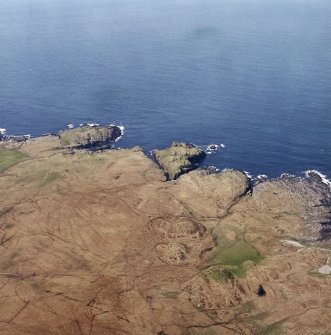 Oblique aerial view centred on the remains of the fort, taken from the E.