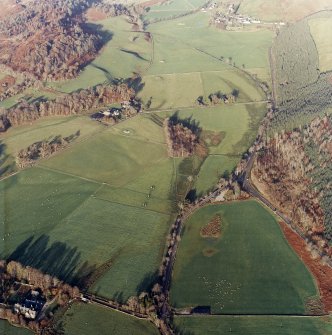 General oblique view of the valley showing the remains of the standing stones and cairns, and the school and farmstead, taken from the SSW.