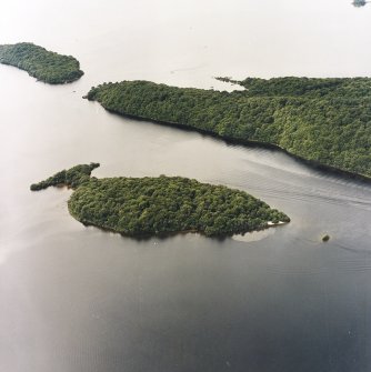 Oblique aerial view centred on Clairinsh Island with crannog adjacent, taken from the ESE.