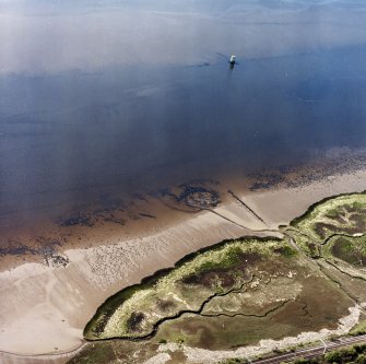 Oblique aerial view centred on the remains of the Dumbuck crannog, taken from the NE.
