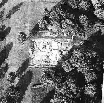 Oblique aerial view of the headquarters building of Bar Hill Roman fort during excavation