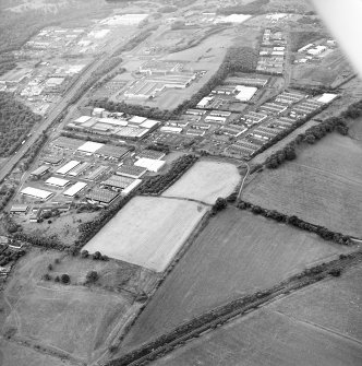 Oblique aerial view centred on the remains of the Antonine Wall, taken from the NE.