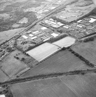 Oblique aerial view centred on the remains of the Antonine Wall, taken from the NNE.